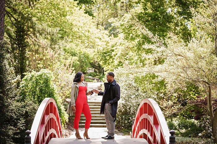 engagement photo on red bridge